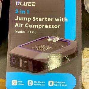 Jump starter with air compressor
